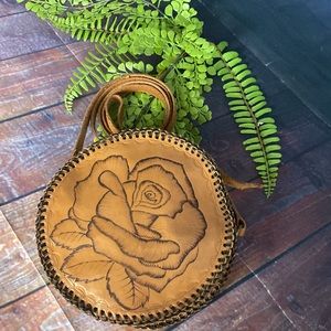 Tooled Rose print Round Leather Canteen Crossbody bag made by an artisan